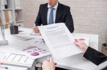 Business Person Reading Contract