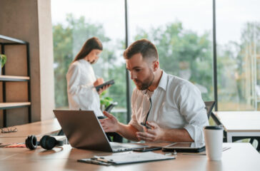 Employees are working in the modern office together
