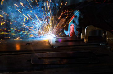 Skilled welder applies their expertise in semi-automatic argon arc welding to carry out welding